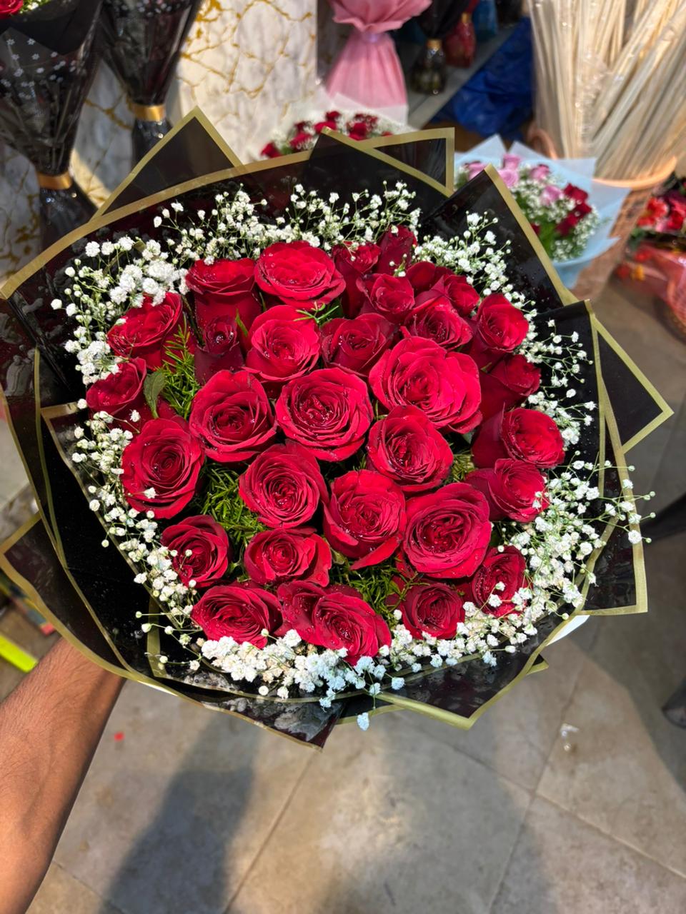 30 Red Rose (Black Paper) by Afroz Florist Hyderabad
